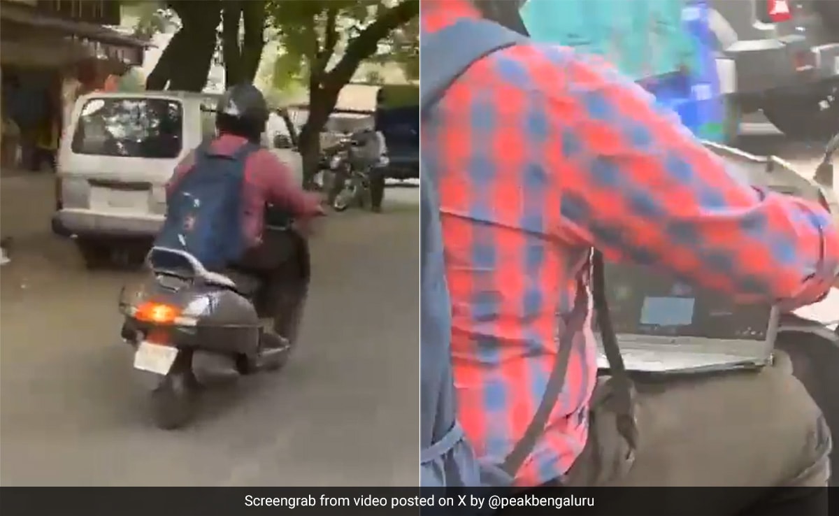 Bengaluru Police React To Video Of Man Working On Laptop While Riding Scooter